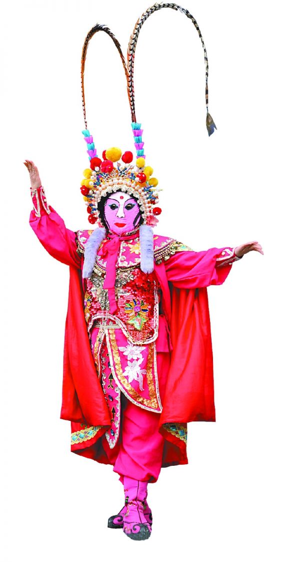 春节文化惠民活动现场，川剧变脸表演。